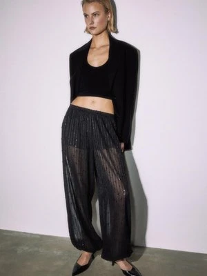 Stradivarius Spodnie bufiasty rękaw cekiny  Czarny