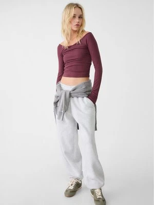 Stradivarius Spodnie jogger boyfriend z dresowej dzianiny  Popielaty