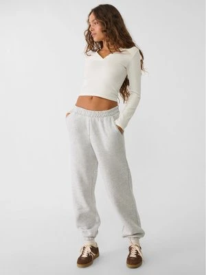 Stradivarius Spodnie jogger boyfriend z dresowej dzianiny  Popielaty