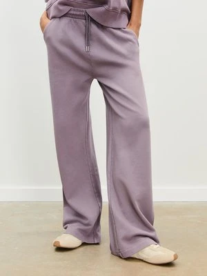 Stradivarius Spodnie jogger proste z efektem sprania  Fioletowy