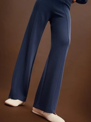 Stradivarius Spodnie jogger z prostymi nogawkami, miękkie w dotyku z przeszyciami  Ciemnomorski