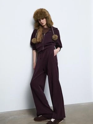 Stradivarius Miękkie spodnie jogger z szerokimi nogawkami i przeszyciami Purpurowy