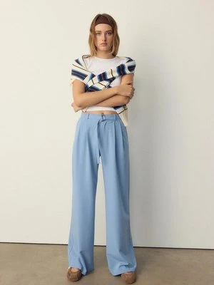 Stradivarius Szerokie spodnie z metalowym elementem  Błękitny