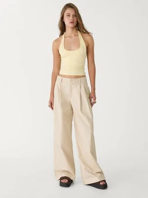 Stradivarius Top z dekoltem halter  Żółty pastelowy