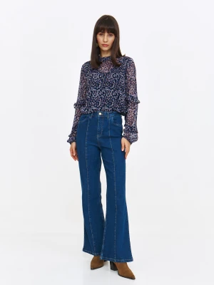 Stylowe granatowe jeansy flare z przeszyciem
