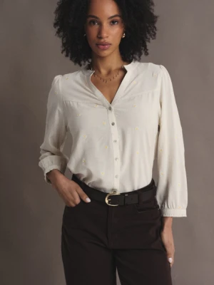 Subtelna kremowa bluzka z riuszką i haftem w stokrotki Greenpoint