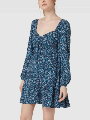 Sukienka mini z kwiatowym wzorem na całej powierzchni model ‘DITSY’ Tommy Jeans