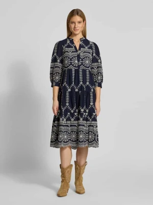 Sukienka tunikowa z dołem obszytym falbaną i haftem angielskim Apricot