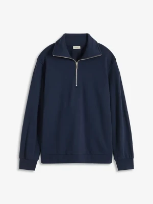 Sweter oversize ze stójką z zamkiem BonPrix niebieski