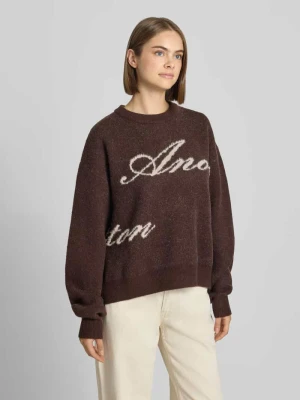 Sweter z dużym signature-napisem Another Cotton Lab Czekoladowy