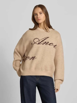 sweter z dzianiny o kroju oversized z detalami z logo Another Cotton Lab Piaskowy