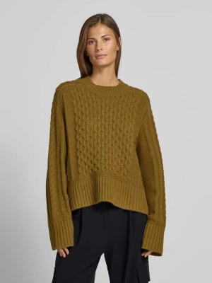 Sweter z warkoczowym splotem o kroju boxy, 100% wełna Style Icon Collection Musztardowy