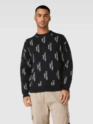 Sweter z dzianiny z napisami z logo na całej powierzchni Calvin Klein Jeans