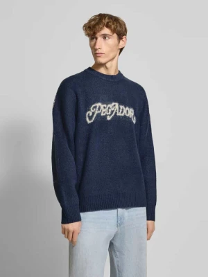 Sweter z dzianiny z prążkowanymi wykończeniami Pegador