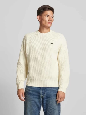 Sweter z dzianiny z wełny z naszywką z logo model ‘BEADED’ Lacoste