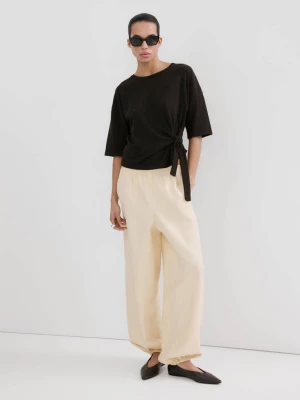 Sweter z dzianiny z wiązaniem u dołu czekoladowy - Kobieta - - MANGO