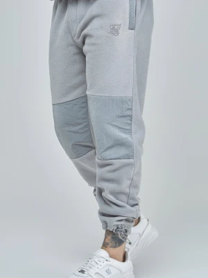 Szare joggery męskie polarowe z mankietami i odcięciami SikSilk