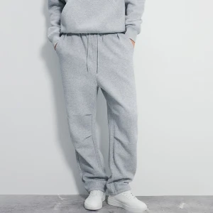 Szare spodnie dresowe baggy z regulacją na dole House