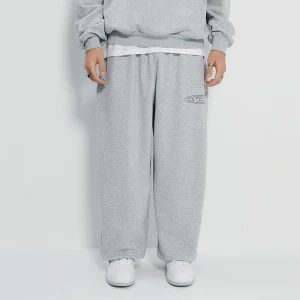 Szare spodnie dresowe super baggy fit z nadrukiem House