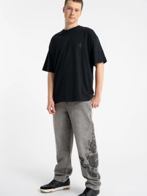 Spodnie chłopięce jeansowe szerokie baggy z haftem na nogawce Reporter