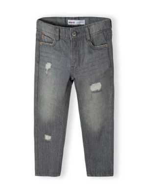 Szare spodnie jeansowe z przetarciami dla chłopca - Minoti