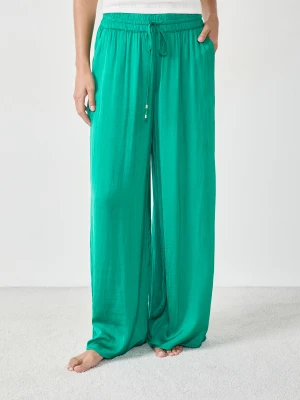 Szerokie satynowe spodnie Etam