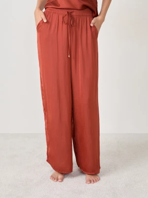 Szerokie satynowe spodnie piżamowe Etam
