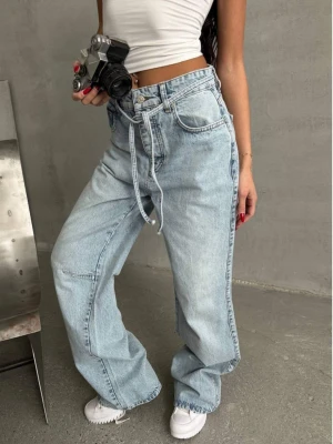 Szerokie spodnie jeansy z wiązaniem ELIF - jasny jeans  magmac 