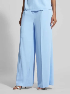 Szerokie spodnie materiałowe z zaprasowanymi kantami Christian Berg Cocktail