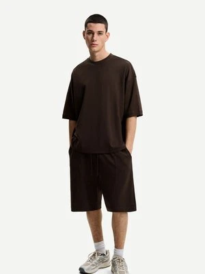 Szorty Bershka ciemnozielony