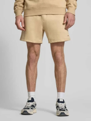 Szorty chinosy o kroju regular fit z mieszanki bawełny Tommy Jeans