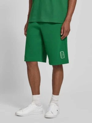 Szorty dresowe o kroju relaxed fit z mieszanka bawełny Lacoste Zielony