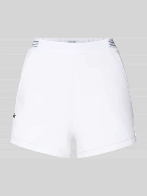 Szorty dresowe w kroju regular fit z aplikacją z logo Lacoste Sport