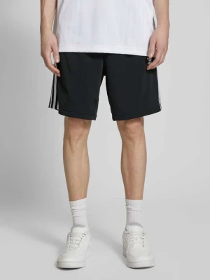 Szorty o kroju relaxed fit z kieszeniami zapinanymi na zamek błyskawiczny model ‘FBIRD’ adidas Originals