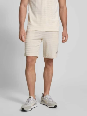 Szorty o kroju slim fit z fakturowanym wzorem model ‘ESS ELEVATED’ PUMA PERFORMANCE