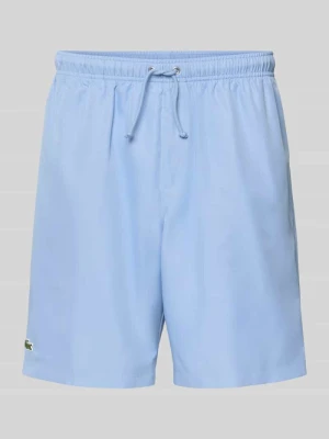 Szorty sportowe o kroju relaxed fit z wyhaftowanym logo Lacoste Sport