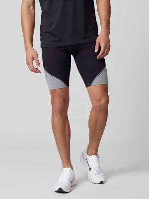 Szorty sportowe o kroju slim fit z nadrukiem z logo Under Armour Czarny