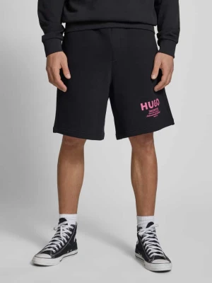 Szorty z dzianiny dresowej o kroju baggy fit z nadrukiem z logo model ‘Nomario’ Hugo Blue