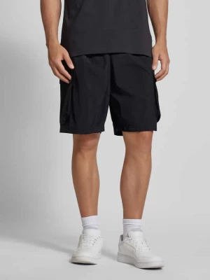 Szorty z dzianiny dresowej o kroju regular fit z kieszeniami cargo ADIDAS SPORTSWEAR