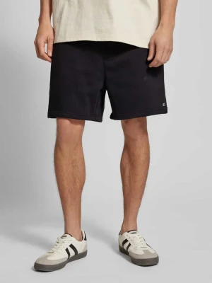 Szorty z dzianiny dresowej o kroju regular fit z mieszanki bawełny Tommy Jeans Czarny