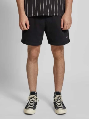 Szorty z dzianiny dresowej o kroju regular fit z naszywką z logo model ‘BEACH’ Tommy Jeans