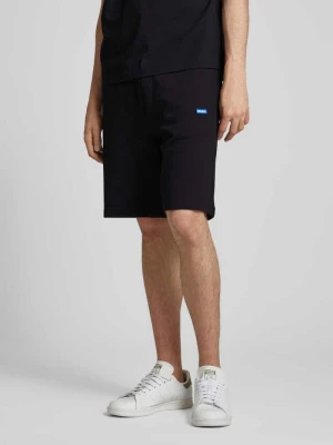 Szorty z dzianiny dresowej o kroju regular fit z naszywką z logo model ‘Nasensio’ Hugo Blue