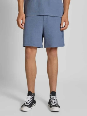 Szorty z dzianiny dresowej o kroju relaxed fit z fakturowanym wzorem Tommy Jeans