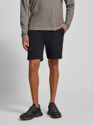 Szorty z dzianiny dresowej o kroju relaxed fit z nadrukiem z logo model ‘Unstoppable’ Under Armour