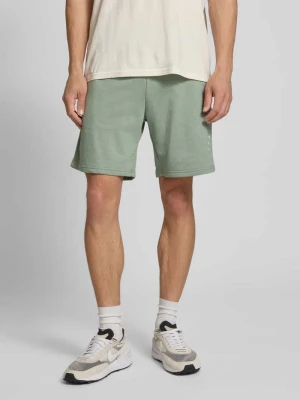 Szorty z dzianiny dresowej z detalem z logo model ‘GORDON’ jack & jones