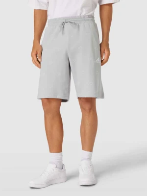 Szorty z nadrukiem z logo na całej powierzchni adidas Sportswear