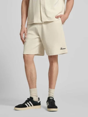 Szorty z naszytym logo REVIEW