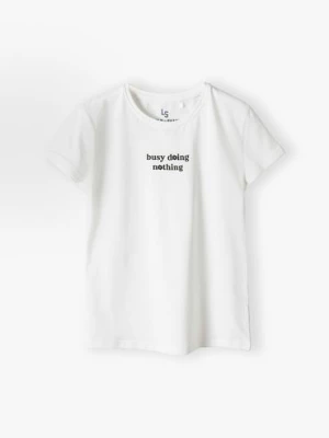 T-shirt bawełniany dla dziewczynki - biały z napisem Busy doing nothing Lincoln & Sharks by 5.10.15.