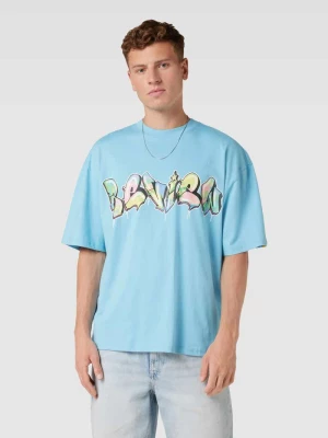 T-shirt o kroju oversized z nadrukiem w stylu graffiti REVIEW