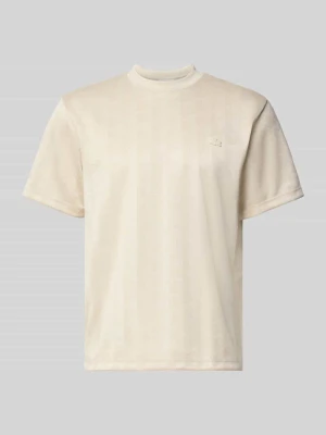 t-shirt o kroju regular fit ze wzorem na całej powierzchni Lacoste Piaskowy melanż